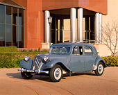 AUT 21 RK1037 02
1953 Citroen Traction Avant Gray 3/4 Side View In Front Of Museum