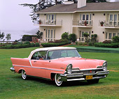AUT 21 RK1083 03
1957 Lincoln Premier Convertible Bermuda Coral Front 3/4 View On Grass