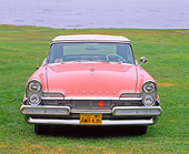 AUT 21 RK1084 01
1957 Lincoln Premier Convertible Bermuda Coral Head On Shot On Grass