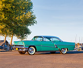 AUT 21 RK1090 01
1956 Mercury Monterey Hardtop Green Low 3/4 Side View On Pavement By Trees