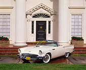 AUT 21 RK1100 02
1957 Ford T-Bird Convertible White 3/4 Front View On Driveway In Front Of House