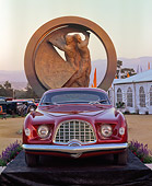 AUT 21 RK1104 01
1953 Chrysler D'Elegance Red Head On Shot By Statue At Dusk