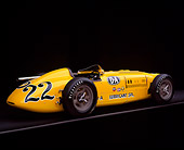 AUT 21 RK1124 05
1953 Kurtis 500B Indy Roadster Yellow 3/4 Side View On Gray Line Studio