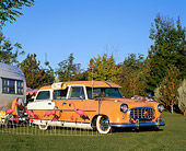 AUT 21 RK1139 08
1955 Hudson Rambler Super Cross Country Orange And White 1955 Hanson Trailer Trees Blue Sky