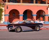 AUT 21 RK1145 01
1952 LaDawri Conquest Convertible Gray And Black Side 3/4 View On Pavement By Building