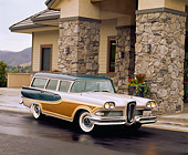 AUT 21 RK1162 04
1958 Edsel Bermuda Station Wagon Beige And Green 3/4 Front View On Wet Pavement By Stone Building