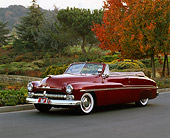 AUT 21 RK1173 01
1950 Mercury Convertible Dark Red 3/4 Front View On Pavement By Fall Trees And Water