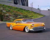 AUT 21 RK1175 13
1957 Buick Century Candy Gold 3/4 Front View On Pavement By Stadium