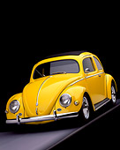 AUT 21 RK1183 01
1956 Volkswagen Bug Rag Top Yellow 3/4 Front View On Gray Floor Studio