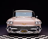 AUT 21 RK1212 19
Wide Angle Shot Of A 1958 Cadillac De Ville Sedan Pink Head On Shot Checkerboard And Purple Floor