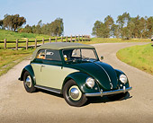 AUT 21 RK1227 04
1950 Volkswagen Karmann Cabriolet Green 3/4 Front View On Pavement By Grass And Trees