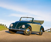 AUT 21 RK1228 06
1950 VW Karmann Cabriolet Green Low 3/4 Front View On Pavement Blue Sky