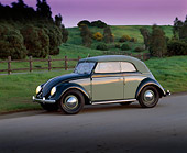 AUT 21 RK1232 01
1950 VW Karmann Cabriolet Green 3/4 Side View On Pavement