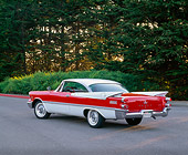 AUT 21 RK1326 02
1959 Dodge Royal Hardtop Red And White 3/4 Rear View On Pavement By Trees