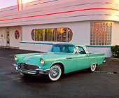 AUT 21 RK1351 01
1957 Ford Thunderbird Hardtop Green 3/4 Front View On Pavement By Diner
