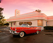 AUT 21 RK1352 01
1957 Chevy Bel Air Convertible Red 3/4 Side View On Pavement By Diner Red Sky