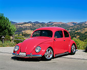 AUT 21 RK1443 07
1955 Volkswagen Oval Window Custom Bug Raspberry 3/4 Front View On Pavement