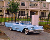 AUT 21 RK1449 01
1959 Ford Thunderbird Convertible Light Blue 3/4 Front View On Driveway By House