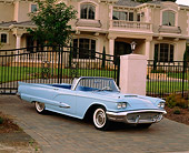 AUT 21 RK1449 03
1959 Ford Thunderbird Convertible Light Blue 3/4 Front View On Driveway By House
