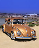 AUT 21 RK1455 03
1958 Volkswagen Bug Gold Roof Rack And Cooler 3/4 Front View On Sand