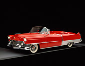 AUT 21 RK1487 02
1954 Cadillac El Dorado Convertible Red And White Side 3/4 View On Gray Line Studio