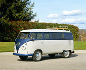 AUT 21 RK1495 05
1959 Volkswagen Microbus Blue And White 3/4 Front View On Pavement By Trees And Bushes