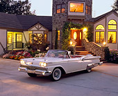 AUT 21 RK1538 01
1959 Ford Fairlane 500 Retractable White 3/4 Front View By Lighted House At Dusk