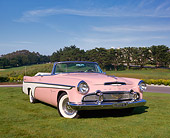 AUT 21 RK1544 06
1956 Desoto Firedome Convertible Pink 3/4 Front View On Grass Blue Sky