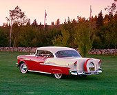 AUT 21 RK1560 05
1955 Chevy Bel Air Red And W White 3/4 Rear View On Grass By Trees At Dusk