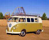 AUT 21 RK1639 03
1959 Volkswagen Microbus Green And White 3/4 Front View On Dirt By Roller Coaster Blue Sky