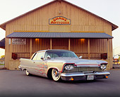 AUT 21 RK1703 04
1958 Chrysler Imperial Lowrider Gray With Flames Low 3/4 Front View On Pavement By Antique Store
