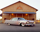AUT 21 RK1704 05
1958 Chrysler Imperial Lowrider Gray With Flames Low 3/4 Side View On Pavement By Anitque Store
