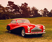 AUT 21 RK1787 02
1951 Talbot Lago T26 Grand Sport Red And Black 3/4 Front View On Grass Trees Background