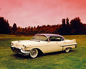 AUT 21 RK1802 03
1957 Cadillac De Ville Creme And Blue 3/4 Front View On Grass