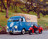 AUT 21 RK1836 04
1954 Volkswagen Single Cab Bus Dove Blue 3/4 Front View On Pavement With 1946 Indian Chief Motorcycle