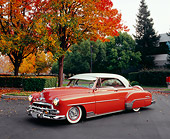 AUT 21 RK1858 02
1952 Chevy Deluxe Salmon And White 3/4 Front View On Pavement By Fall Trees