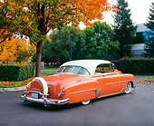 AUT 21 RK1859 02
1952 Chevy Deluxe Salmon And White 3/4 Rear View On Pavement By Fall Trees