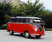 AUT 21 RK1876 03
1955 Volkswagen 23 Window Bus Red And Brown 3/4 Side View On Pavement By Trees