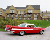AUT 21 RK1883 01
1958 Chrysler Saratoga Red And White 3/4 Rear View On Pavement By Building