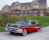 AUT 21 RK1892 04
1958 Ford Skyliner Red And Black 3/4 Front View On Pavement By Building