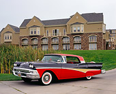 AUT 21 RK1893 01
1958 Ford Skyliner Red And Black 3/4 Side View On Pavement By Mansion