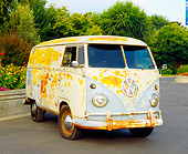 AUT 21 RK1895 03
1959 Volkswagen Bus Type II Front 3/4 View On Pavement By Flowers Trees