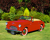 AUT 21 RK1916 01
1952 Austin A40 Sports Coupe Convertible Red 3/4 Front View On Grass By Trees