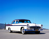 AUT 21 RK1935 02
1956 Chrysler New Yorker Windsor White And Brown 3/4 Front View On Pavement Blue Sky