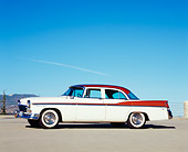 AUT 21 RK1937 02
1956 Chrysler Windsor White And Brown 3/4 Side View On Pavement Blue Sky