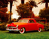 AUT 21 RK1938 01
1952 Dodge, Wayfarer, Red Side 3/4 View On Grass By Flowers And Trees