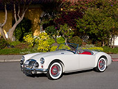 AUT 21 RK1957 01
1959 MG MGB Convertible Gray Red Interior 3/4 Side View On Pavement