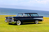 AUT 21 RK1995 02
1957 Chevy Nomad Station Wagon Black 3/4 Side View On Grass By Water