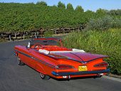 AUT 21 RK2000 01
1959 Chevrolet Impala Convertible Red 3/4 Rear View On Pavement By Trees