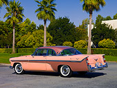 AUT 21 RK2010 01
1956 De Soto Fireflite Sportsman Pink 3/4 Rear View On Pavement By Palm Trees